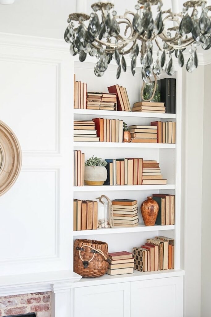 how to style a bookcase neutral backwards books edited