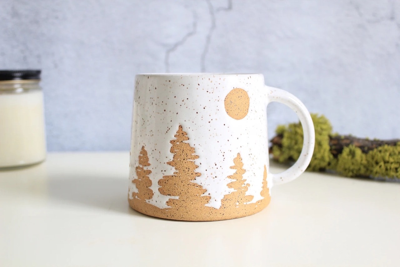 cozy mugs for every season winter trees