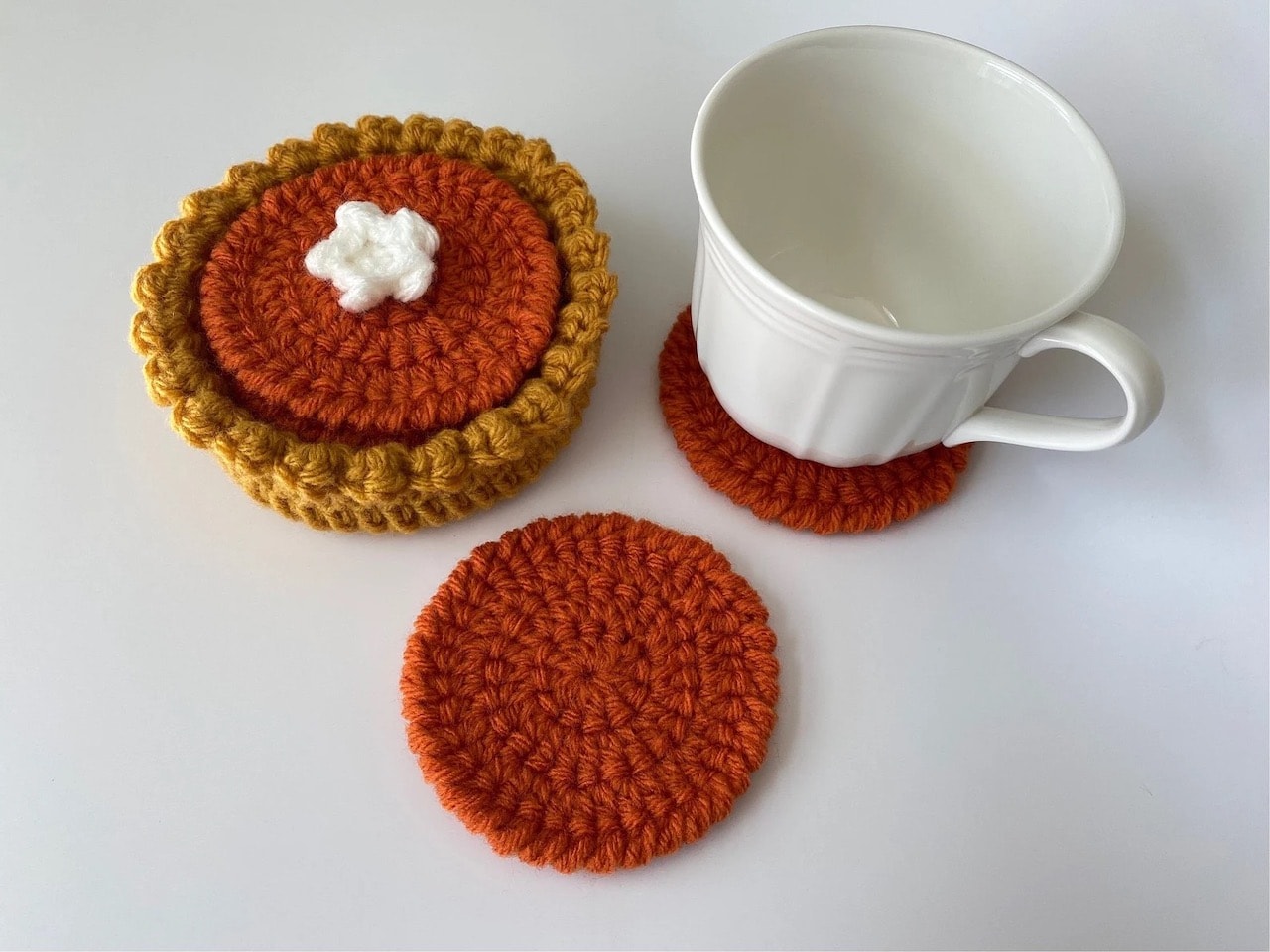 cozy gift ideas for homebodies pumpkin pie crochet coasters