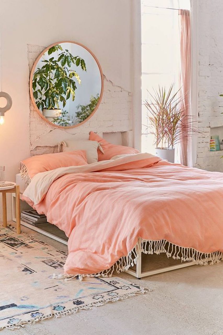 how to design with peach fuzz pantone color of the year 2024 interior design bedroom bedding