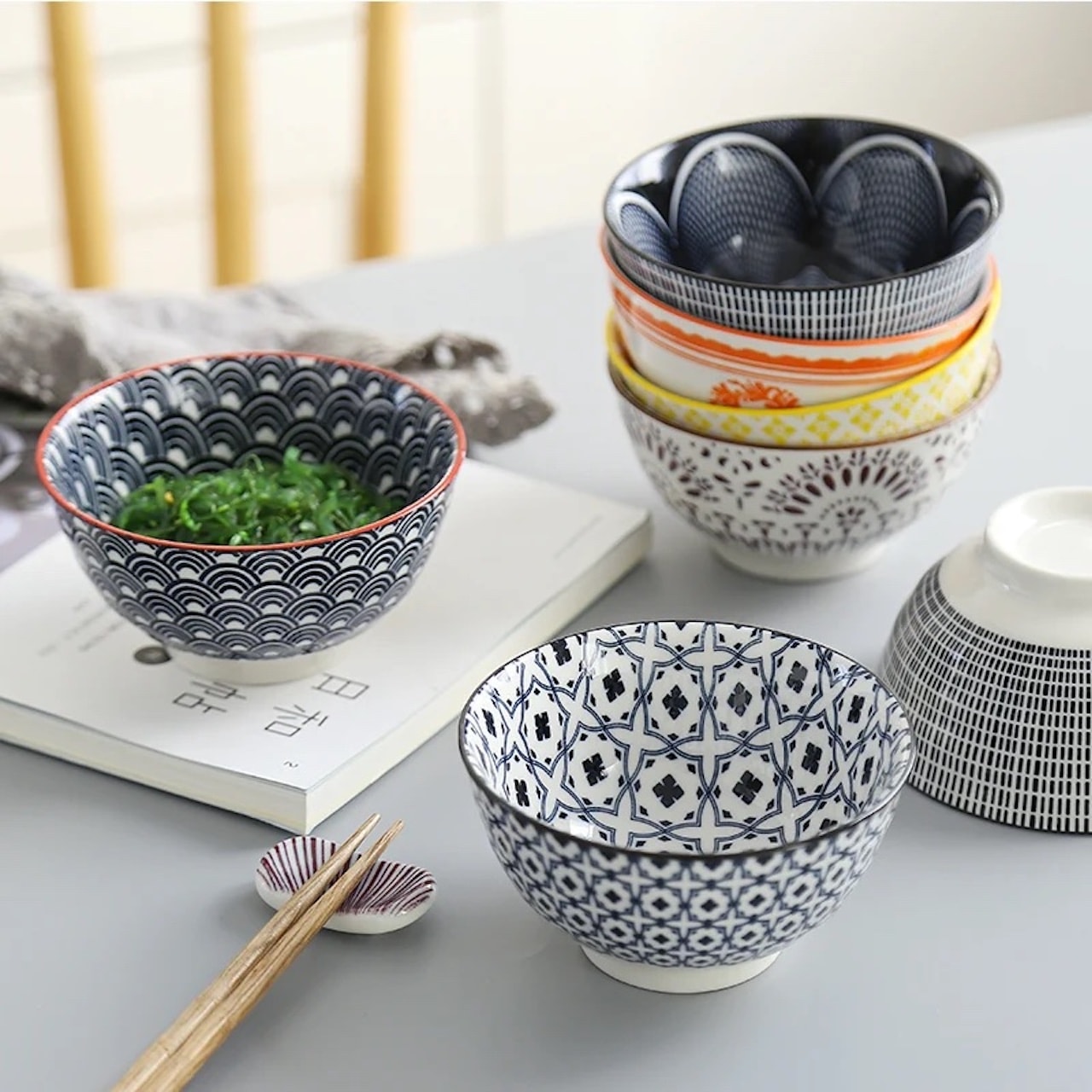 creative ways display travel souvenirs at home ceramic rice bowls